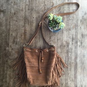 Linea Pelle suede crossbody hobo bag with fringe